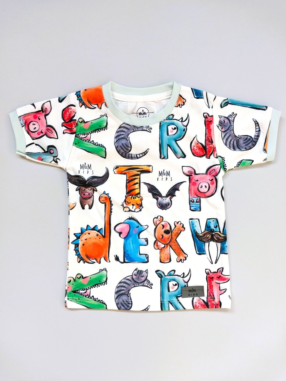 ست تیشرت شلوار راحتی بچگانه  طرح الفبا مناسب 1 تا 10 سال