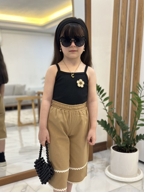 ست تاپ و شلوارک بچگانه طرح گلبرگ مناسب 2 تا 9 سال